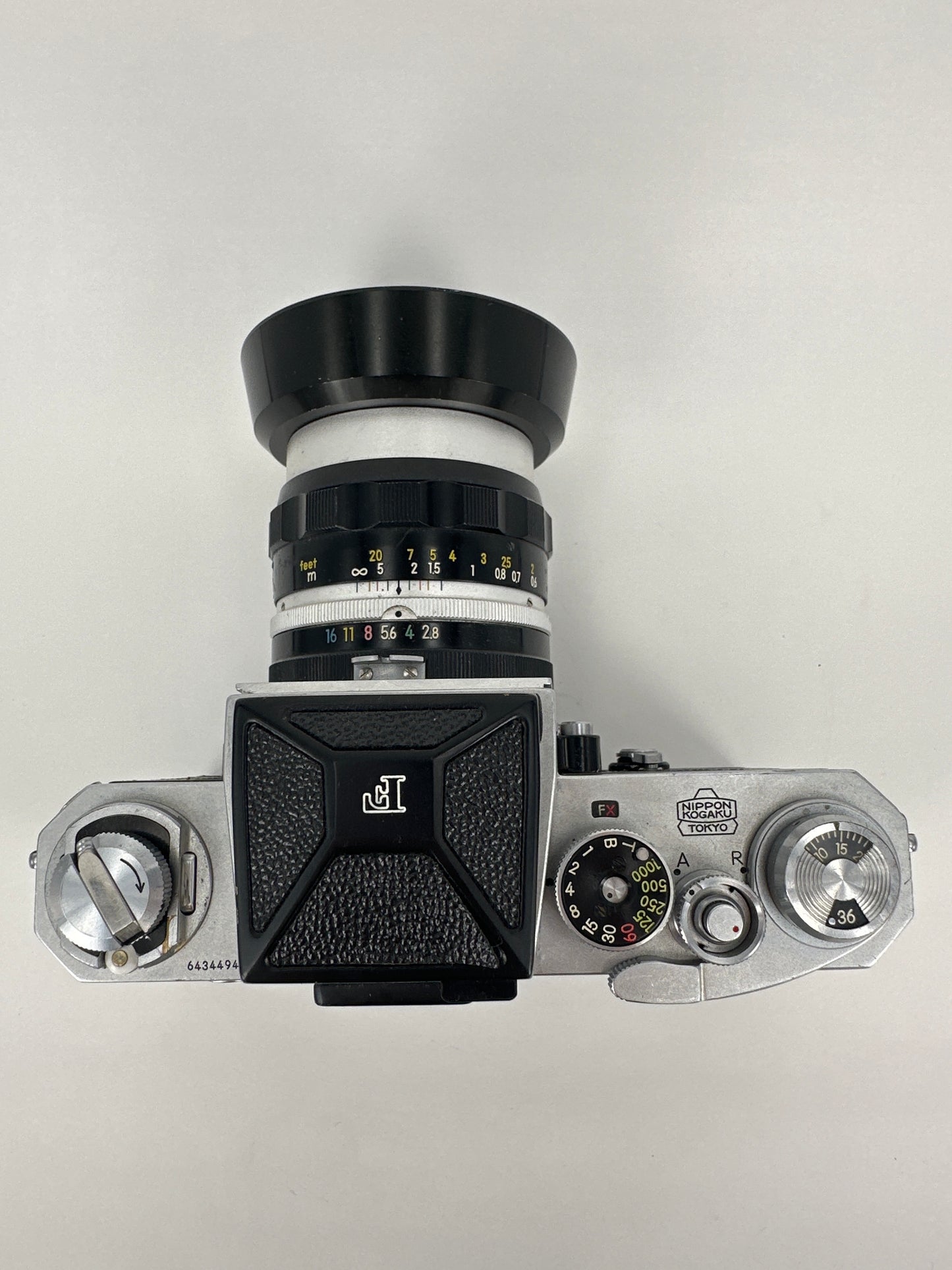 Nikon F with waist level finder, Nikkor-S Auto 3.5cm f2.8 lens and lens hood