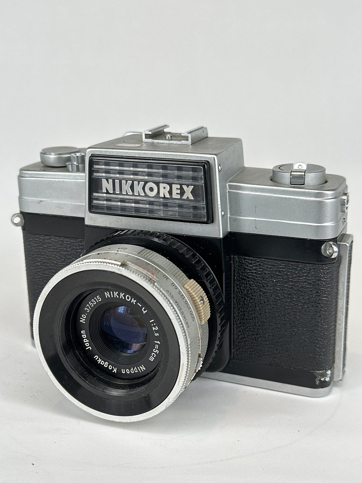 Nikkorex with 50mm f2.5 lens and 2 auxiliary lenses: Nikkorex-Tele f5.6 and Nikkorex-Wide f5.6
