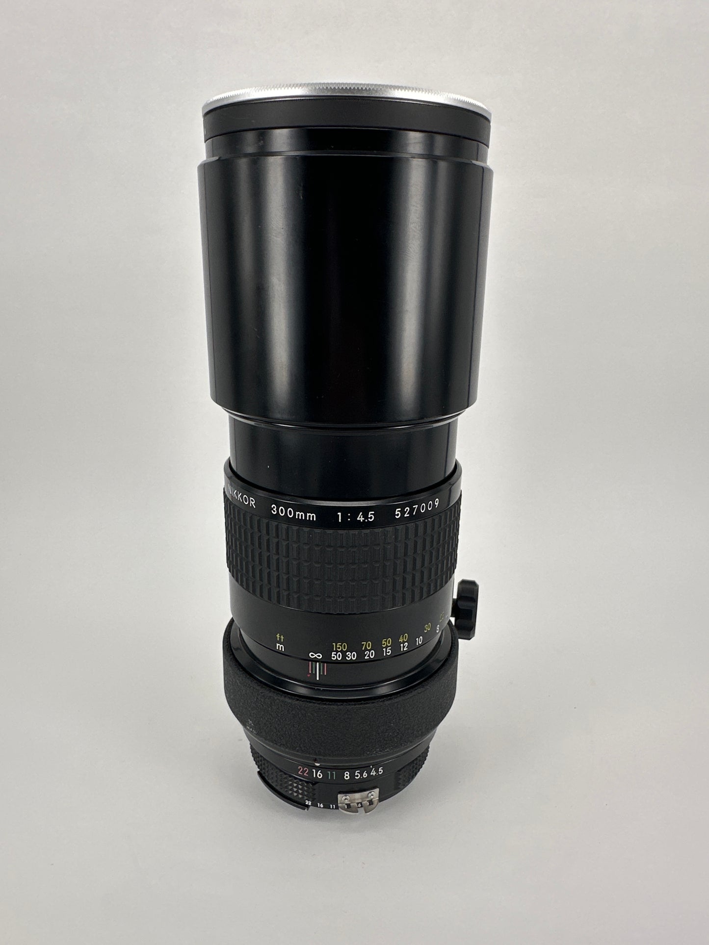 Nikkor 300mm f4.5 Pre-AI with AI adaptation lens with Nikon Lens Cap