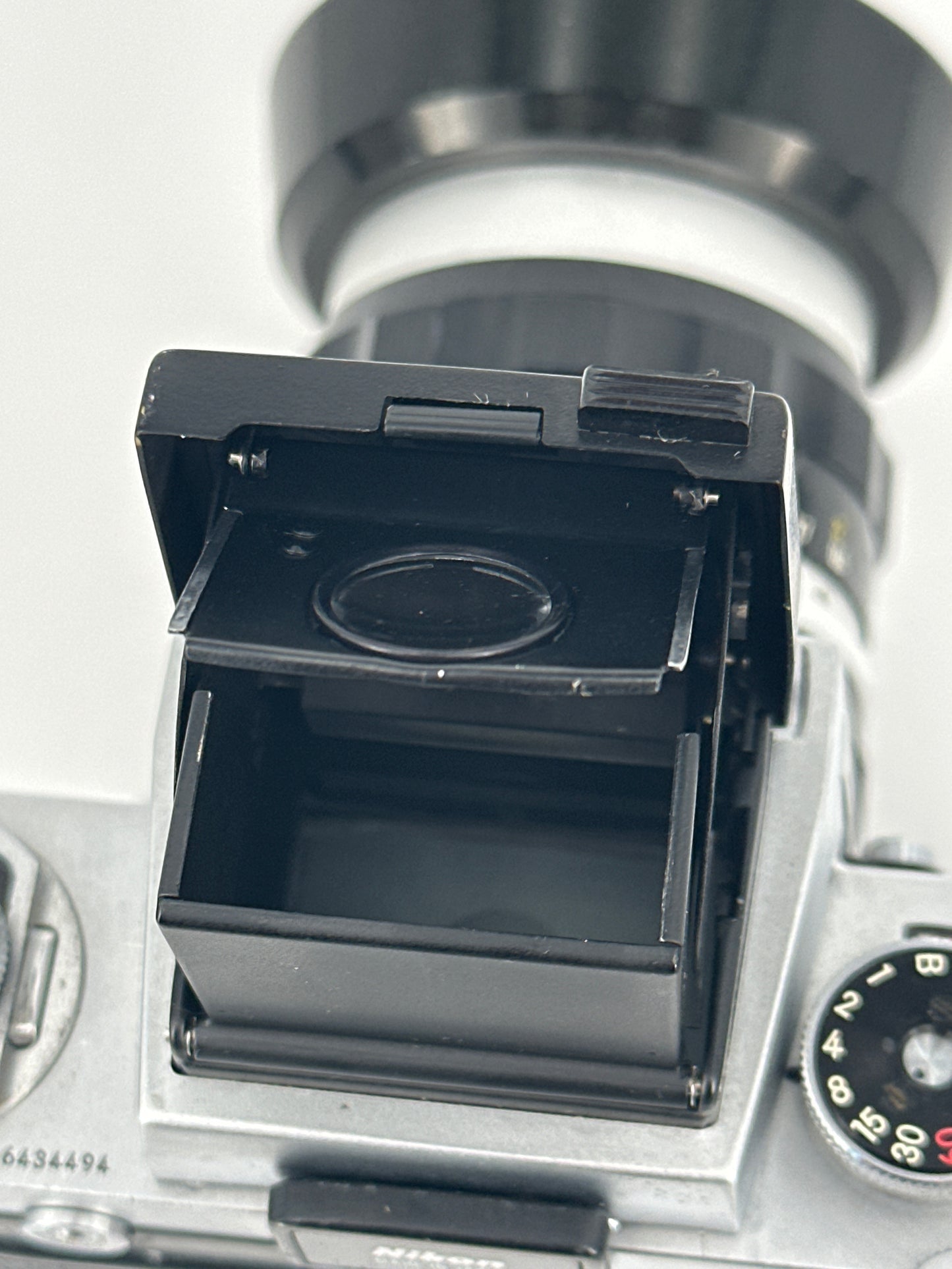 Nikon F with waist level finder, Nikkor-S Auto 3.5cm f2.8 lens and lens hood