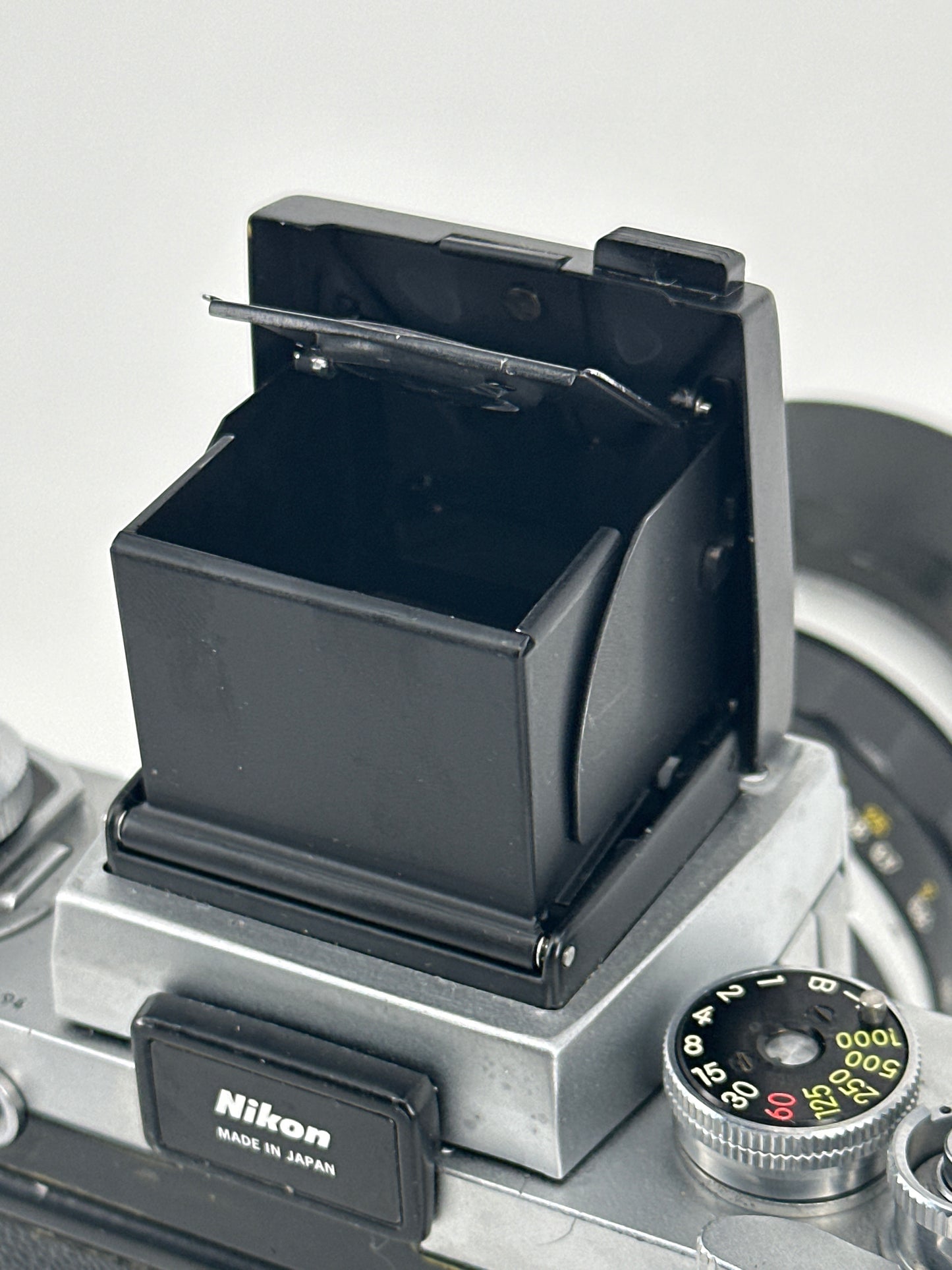 Nikon F with waist level finder, Nikkor-S Auto 3.5cm f2.8 lens and lens hood