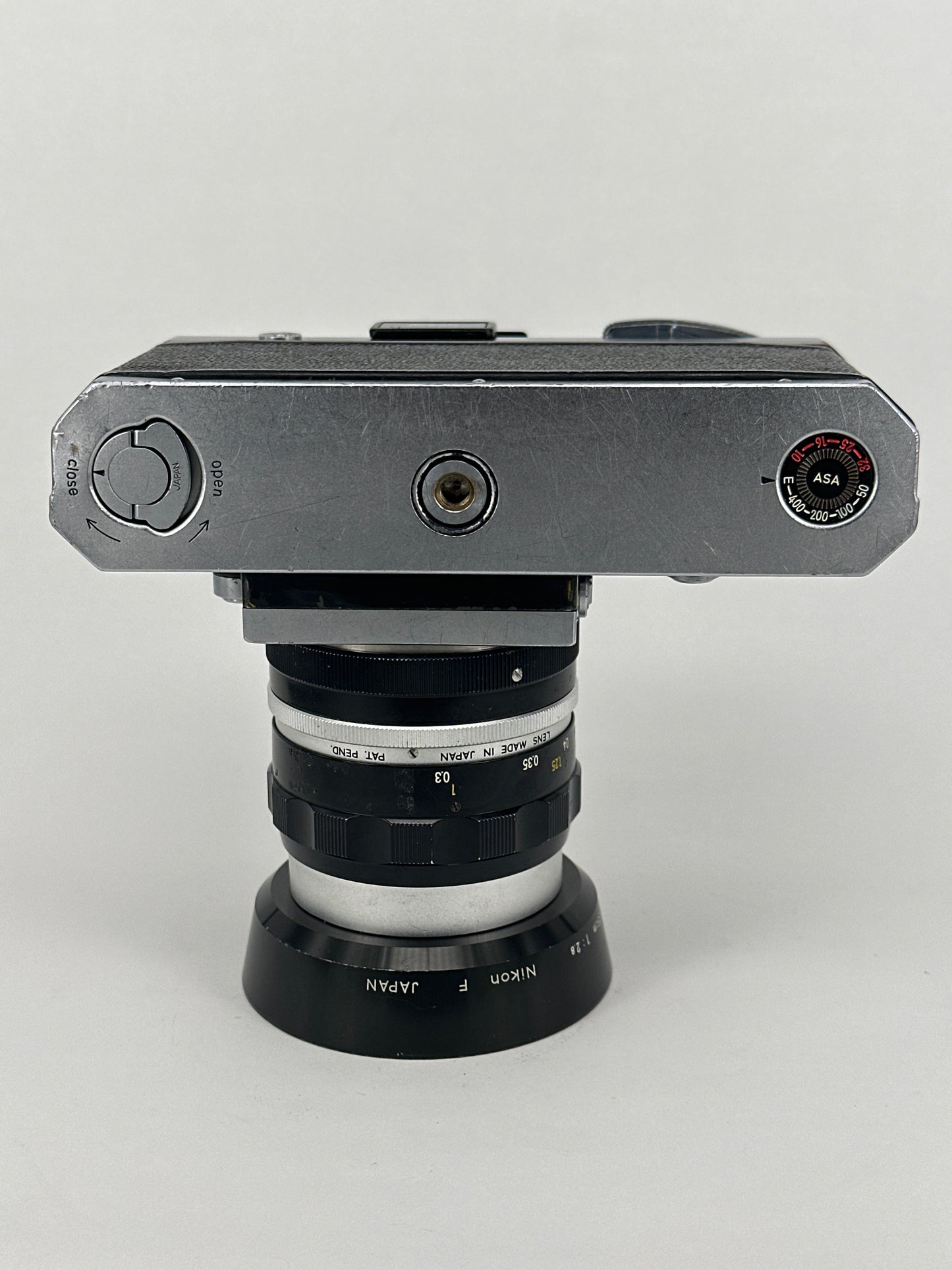 Nikon F with waist level finder, Nikkor-S Auto 3.5cm f2.8 lens and lens hood