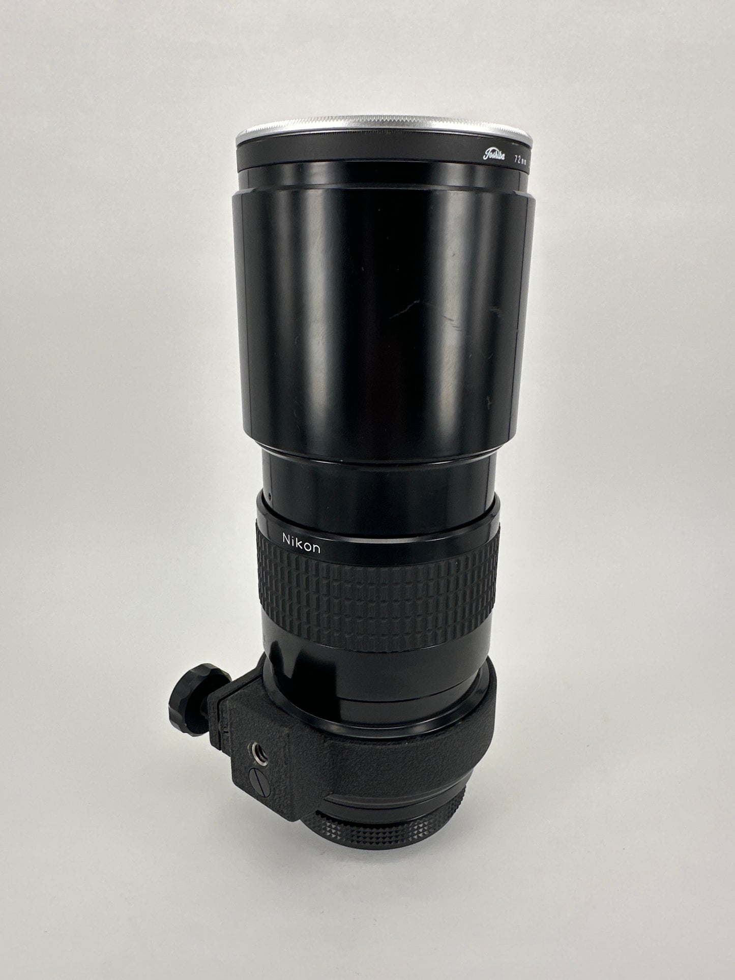Nikkor 300mm f4.5 Pre-AI with AI adaptation lens with Nikon Lens Cap