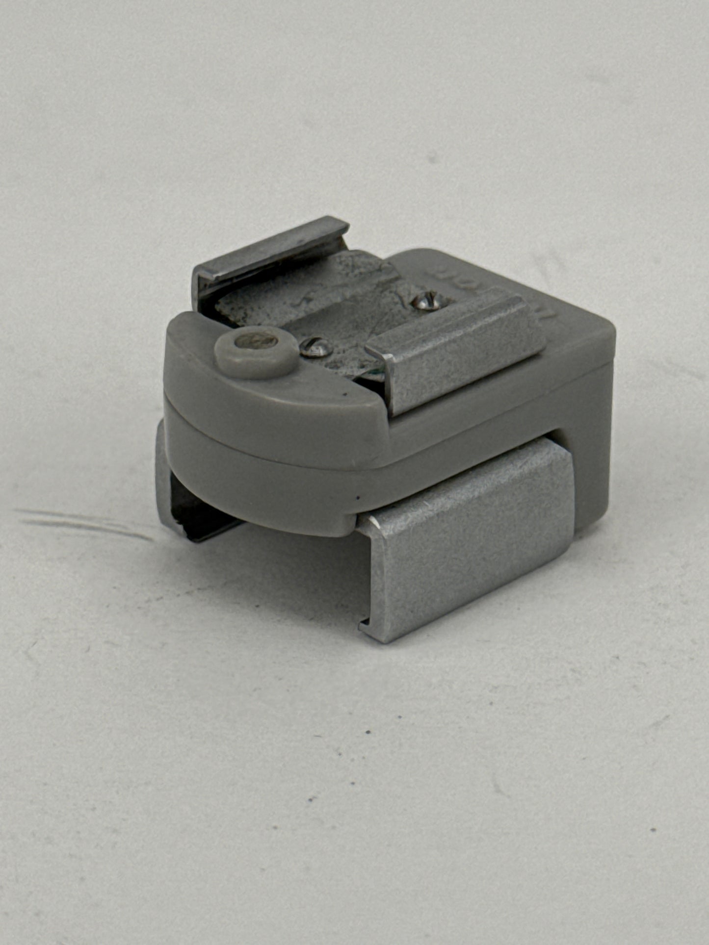 Nikon F flash coupler